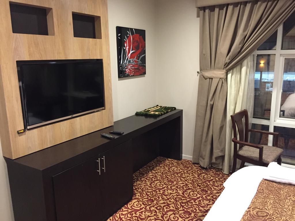 Ashbonh Hotel Suites Riade Quarto foto